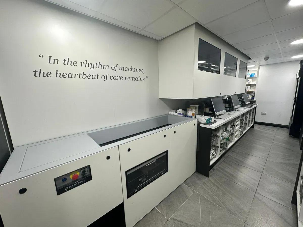 Automated dispensing robot storing and retrieving prescriptions at Carlton Pharmacy