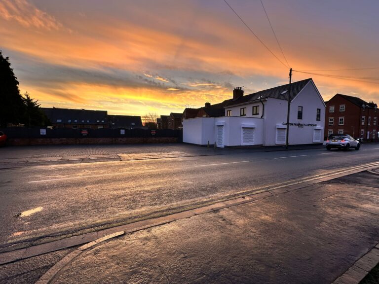 Carlton Pharmacy at sunset